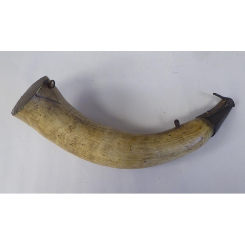 59 - A powder horn with an applied metal dispensing mechanism, inscribed MD No.9  12