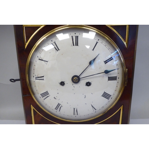 60 - A George III mahogany cased bracket clock with a stepped top, gilt metal pineapple finial and brass ... 