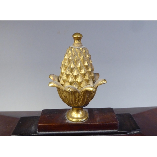 60 - A George III mahogany cased bracket clock with a stepped top, gilt metal pineapple finial and brass ... 