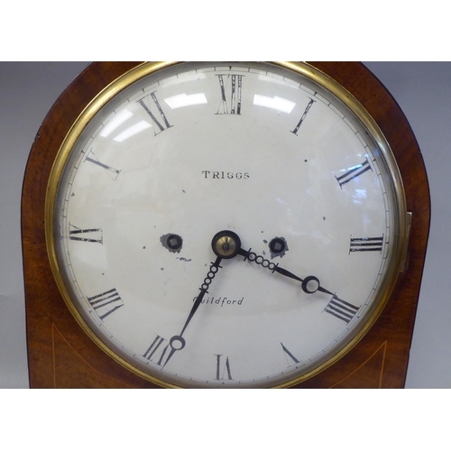 62 - A George III round arch cased and string inlaid bracket clock with gilt metal flank lion mask and ri... 