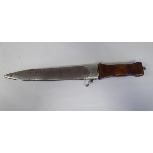 68 - A German dagger with a wooden handgrip, the blade with an engraved motto  9