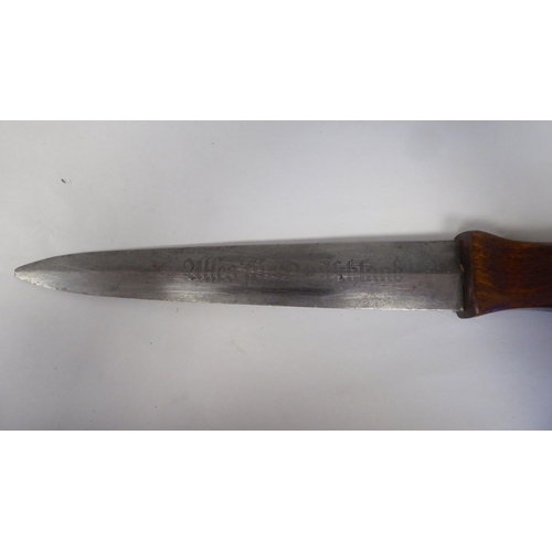 68 - A German dagger with a wooden handgrip, the blade with an engraved motto  9