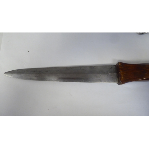 68 - A German dagger with a wooden handgrip, the blade with an engraved motto  9