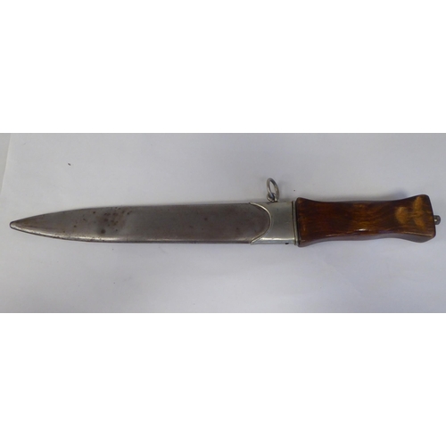 68 - A German dagger with a wooden handgrip, the blade with an engraved motto  9