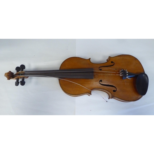 69 - A violin with a two-part back and purfled edge  14