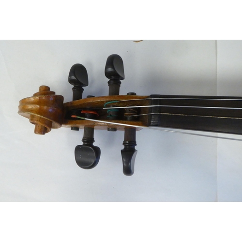 69 - A violin with a two-part back and purfled edge  14