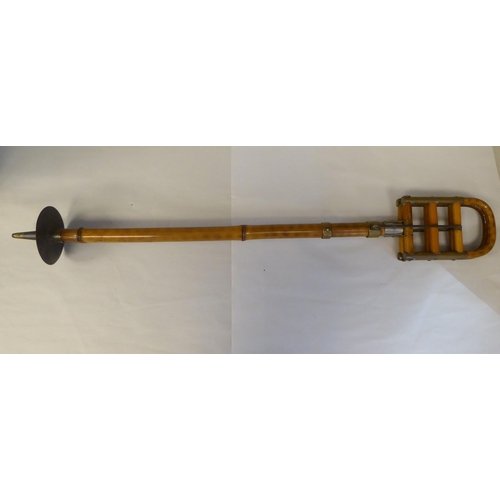 7 - An Edwardian bamboo shooting stick with brass and steel mounts