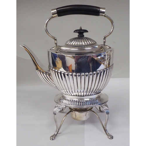 82 - A late Victorian four piece silver tea set of oval, demi-reeded form  comprising a teapot and pedest... 