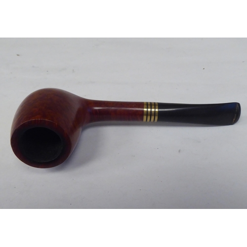 85 - A Georg Jensen briarwood smoker's pipe, in a dedicated pouch