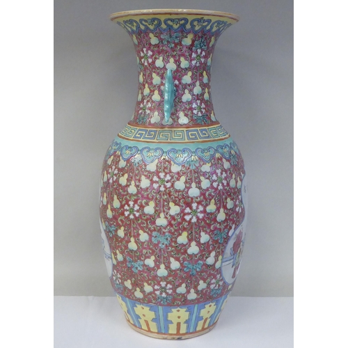 91 - A late 19th/early 20thC Chinese porcelain baluster shape vase with a narrow neck and flared rim, dec... 