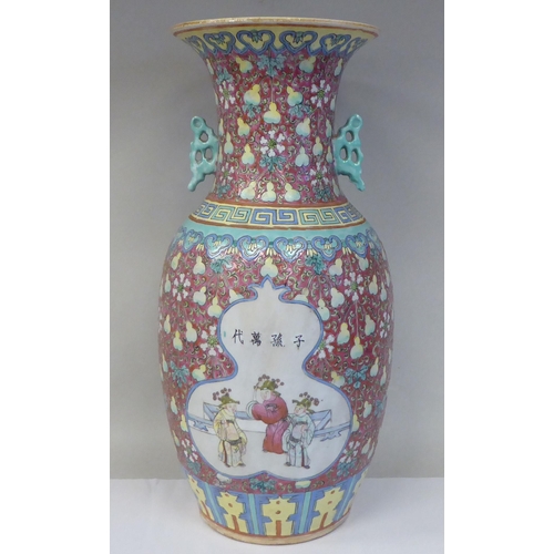 91 - A late 19th/early 20thC Chinese porcelain baluster shape vase with a narrow neck and flared rim, dec... 