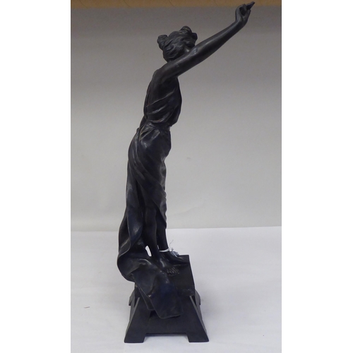 94 - After E Villanis - a cast and patinated standing figure, a classically inspired female artist, on a ... 