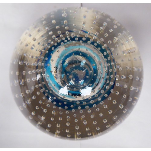 109 - A vintage Whitefriars glass doorstop of domed, clear, bubbled form, decorated on the interior with a... 