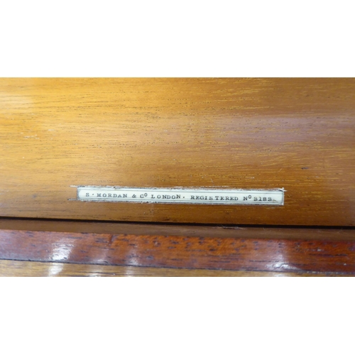 22 - A late 19thC S.Mordan & Co, London Registered Inkstand & Copying Press, including a stationa... 