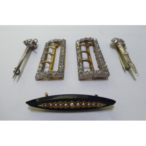 228 - Jewellery: to include a late Victorian black and yellow metal brooch, set with seed pearls 