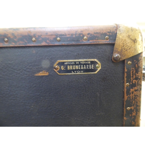 234 - A black faux hide covered salesman's trunk with metal bracket supports  37