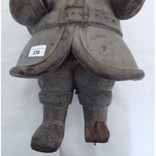 236 - A carved fruitwood figure 'Father Christmas'  20