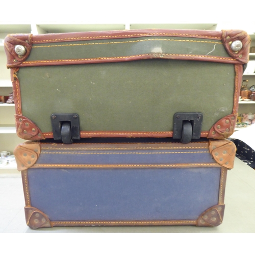 241 - Two similar canvas bound and leather clad suitcases  9