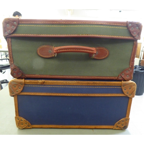 241 - Two similar canvas bound and leather clad suitcases  9