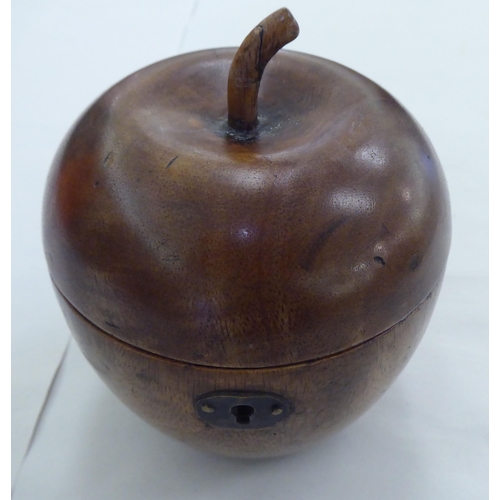 242 - An early 19thC fruitwood tea caddy, fashioned as an apple with a hinged lid  5.5