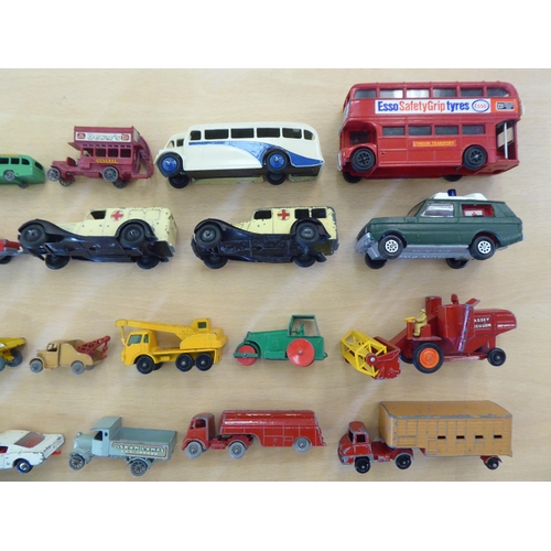 243 - Diecast model vehicles: to include a Lesney Combine Harvester; and two ambulances by Dinky