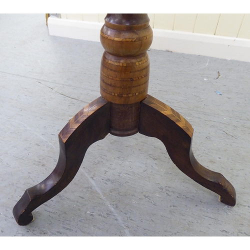 89 - A 19thC hardwood pedestal table, embellished with a variety of inlaid exotic species, the parquetry ... 