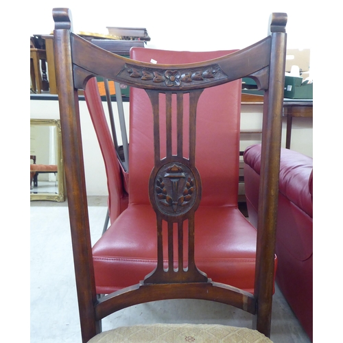 228 - A set of four Edwardian mahogany framed salon chairs, each with a splat back and upholstered seat, r... 