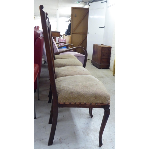 228 - A set of four Edwardian mahogany framed salon chairs, each with a splat back and upholstered seat, r... 