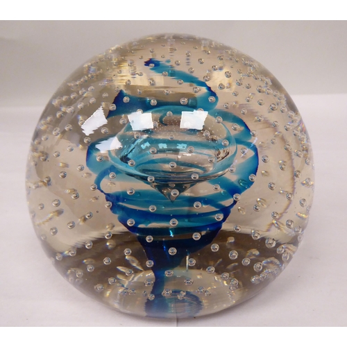 131 - A vintage Whitefriars glass doorstop of domed, clear, bubbled form, decorated on the interior with a... 