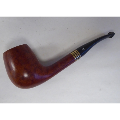 142 - A Georg Jensen briarwood smoker's pipe, in a dedicated pouch