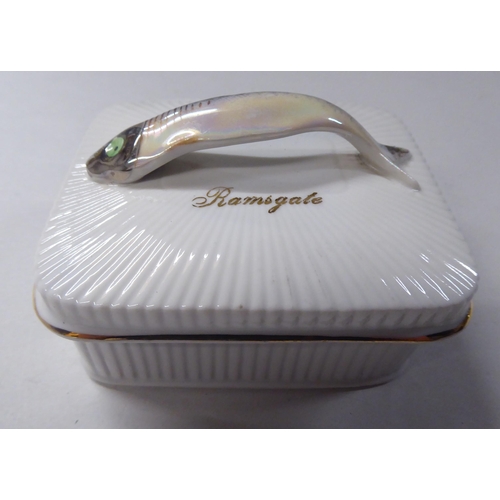 148 - Four dissimilar china table sardine boxes: to include one featuring a lobster handle, on scrolled fe... 