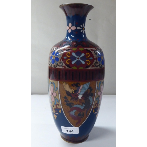 151 - An early 20thC cloisonné shouldered, baluster shape vase, decorated in colours and panels, depicting... 