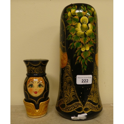 222 - A Russian turned and painted softwood bottle vase, featuring a young woman wearing traditional costu... 