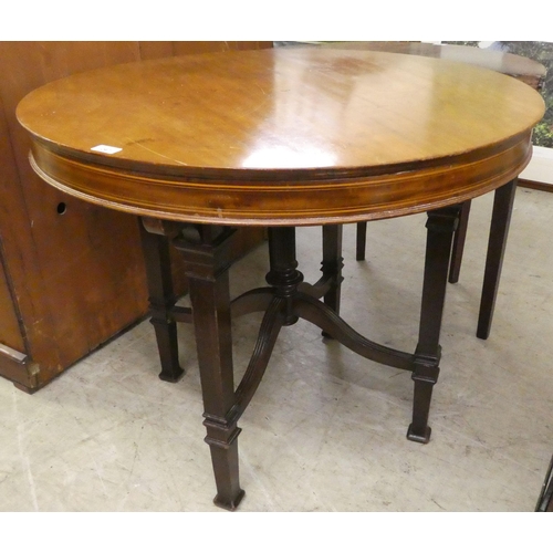 247 - An Edwardian satinwood inlaid mahogany centre table, raised on square legs  30