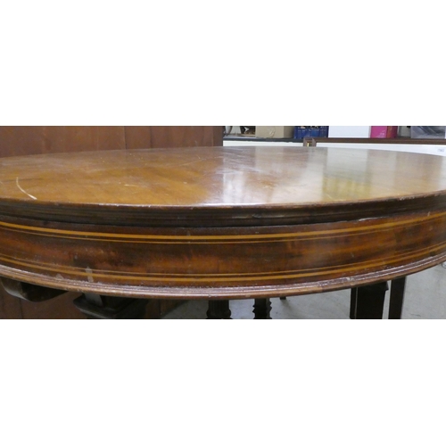 247 - An Edwardian satinwood inlaid mahogany centre table, raised on square legs  30