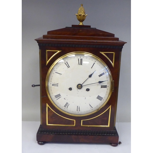 287 - A George III mahogany cased bracket clock with a stepped top, gilt metal pineapple finial and brass ... 