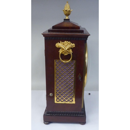 287 - A George III mahogany cased bracket clock with a stepped top, gilt metal pineapple finial and brass ... 