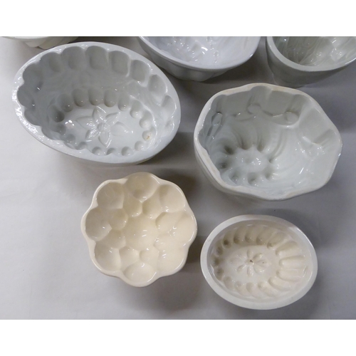 61 - 19thC & later glazed china jelly moulds  various designs & sizes