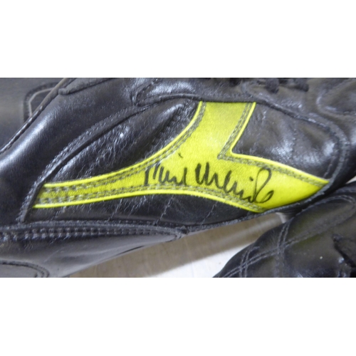 10 - A pair of Diadora 10 football boots, signed by Phil Neville  Size 9.5