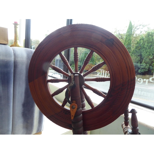 101 - A 20thC stained pine spinning wheel  46