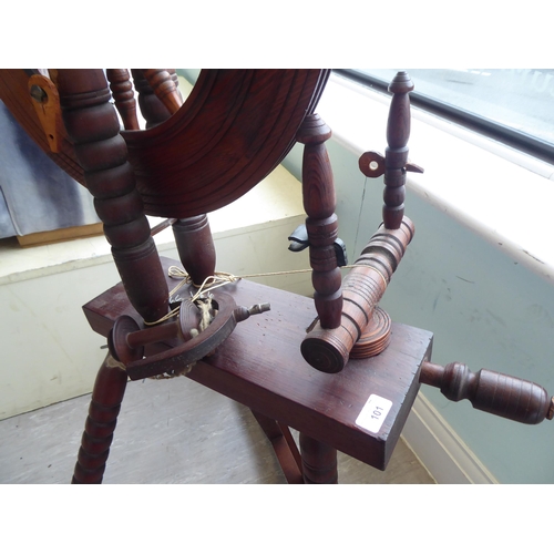 101 - A 20thC stained pine spinning wheel  46