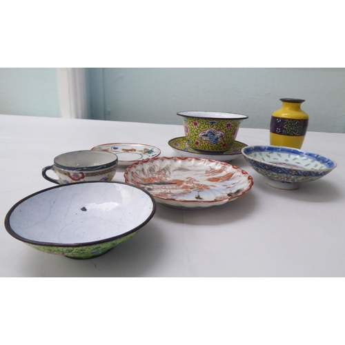 102 - Oriental collectables: to include a mid 20thC enamel lidded bowl, on a saucer