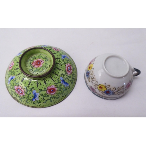 102 - Oriental collectables: to include a mid 20thC enamel lidded bowl, on a saucer