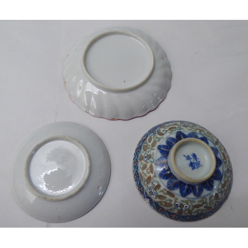 102 - Oriental collectables: to include a mid 20thC enamel lidded bowl, on a saucer