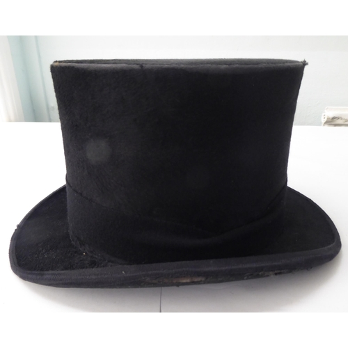 114 - A Colletts of London black silk top hat  8