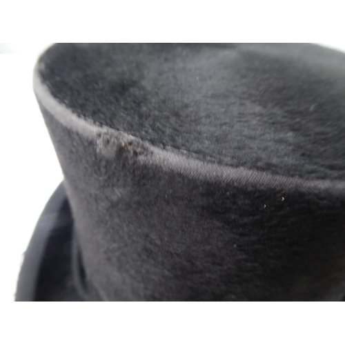 114 - A Colletts of London black silk top hat  8