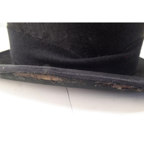 114 - A Colletts of London black silk top hat  8