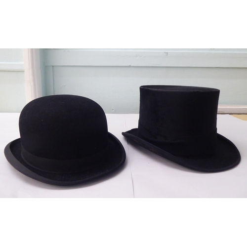 114 - A Colletts of London black silk top hat  8