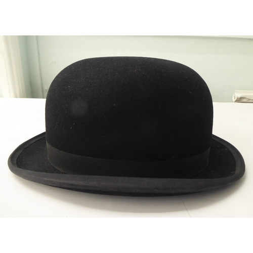 114 - A Colletts of London black silk top hat  8