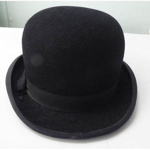 114 - A Colletts of London black silk top hat  8